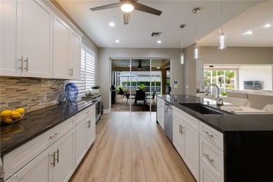 Step into modern luxury with this completely renovated Osprey on Herons Glen Golf and Country Club in Florida - for sale on GolfHomes.com, golf home, golf lot