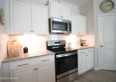 Welcome to your dream home in the highly sought-after community on Ocean Ridge Plantation in North Carolina - for sale on GolfHomes.com, golf home, golf lot