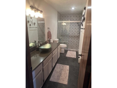 Beautiful getaway in Angel Fire only 1.7 mi from the ski base on Angel Fire Resort Country Club in New Mexico - for sale on GolfHomes.com, golf home, golf lot