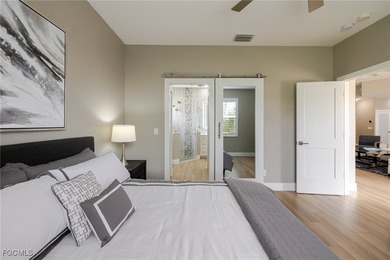 Step into modern luxury with this completely renovated Osprey on Herons Glen Golf and Country Club in Florida - for sale on GolfHomes.com, golf home, golf lot