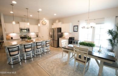 Welcome to your dream home in the highly sought-after community on Ocean Ridge Plantation in North Carolina - for sale on GolfHomes.com, golf home, golf lot