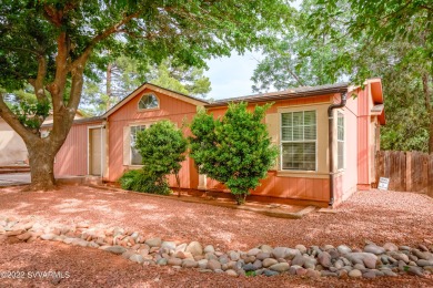 This spacious single level manufactured home is situated less on Canyon Mesa Country Club in Arizona - for sale on GolfHomes.com, golf home, golf lot