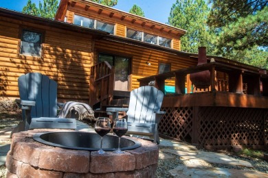Beautiful getaway in Angel Fire only 1.7 mi from the ski base on Angel Fire Resort Country Club in New Mexico - for sale on GolfHomes.com, golf home, golf lot