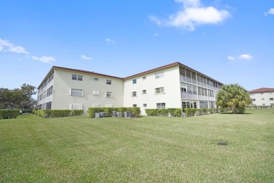 This is THE LOWEST PRICE 2 Bedroom Move in Ready in Century on Flamingo Lakes Country Club in Florida - for sale on GolfHomes.com, golf home, golf lot