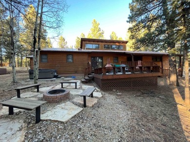Beautiful getaway in Angel Fire only 1.7 mi from the ski base on Angel Fire Resort Country Club in New Mexico - for sale on GolfHomes.com, golf home, golf lot