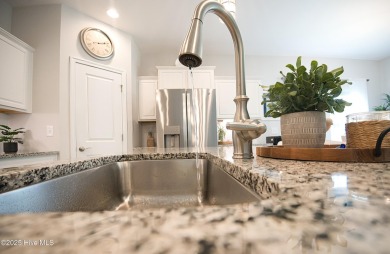 Welcome to your dream home in the highly sought-after community on Ocean Ridge Plantation in North Carolina - for sale on GolfHomes.com, golf home, golf lot