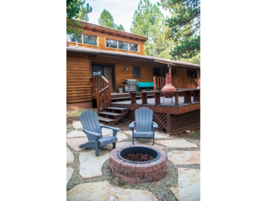 Beautiful getaway in Angel Fire only 1.7 mi from the ski base on Angel Fire Resort Country Club in New Mexico - for sale on GolfHomes.com, golf home, golf lot