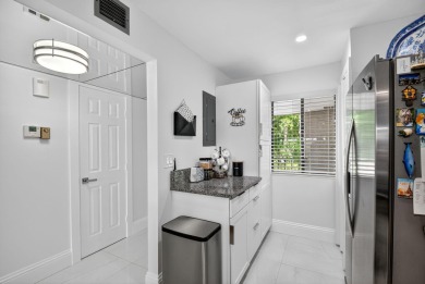 Do not miss this stunning totally remodeled furnished negotiable on Fountains Golf and Country Club in Florida - for sale on GolfHomes.com, golf home, golf lot