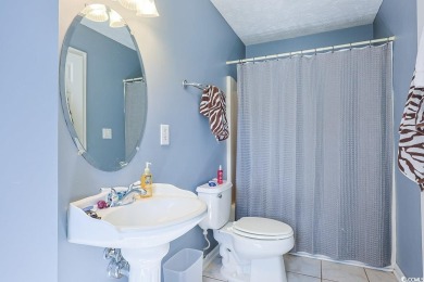Welcome to 4721 National Dr, a stunning home perfectly situated on Myrtle Beach National Golf Course in South Carolina - for sale on GolfHomes.com, golf home, golf lot