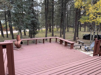 Beautiful getaway in Angel Fire only 1.7 mi from the ski base on Angel Fire Resort Country Club in New Mexico - for sale on GolfHomes.com, golf home, golf lot