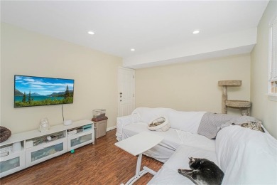 Enter into modern comfort and convenience with this beautifully on South Shore Golf Course in New York - for sale on GolfHomes.com, golf home, golf lot