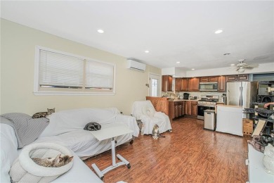 Enter into modern comfort and convenience with this beautifully on South Shore Golf Course in New York - for sale on GolfHomes.com, golf home, golf lot