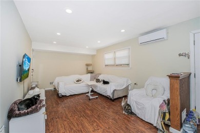 Enter into modern comfort and convenience with this beautifully on South Shore Golf Course in New York - for sale on GolfHomes.com, golf home, golf lot