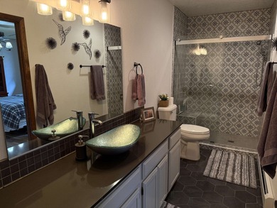 Beautiful getaway in Angel Fire only 1.7 mi from the ski base on Angel Fire Resort Country Club in New Mexico - for sale on GolfHomes.com, golf home, golf lot