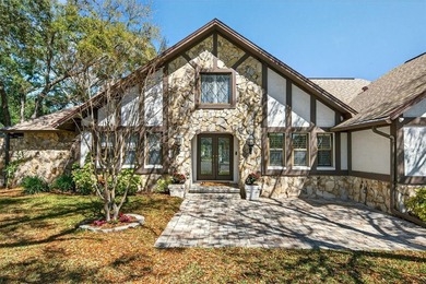 One or more photo(s) has been virtually staged. *Tudor Style*
 on Feather Sound Country Club in Florida - for sale on GolfHomes.com, golf home, golf lot
