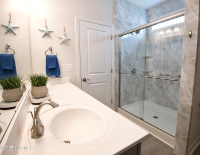 Welcome to your dream home in the highly sought-after community on Ocean Ridge Plantation in North Carolina - for sale on GolfHomes.com, golf home, golf lot