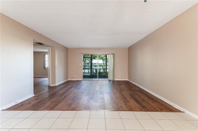 Discover this beautiful & impeccable FIRST-FLOOR condo in a on Wynmoor Golf Course in Florida - for sale on GolfHomes.com, golf home, golf lot