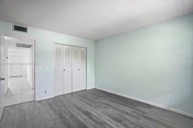 This is THE LOWEST PRICE 2 Bedroom Move in Ready in Century on Flamingo Lakes Country Club in Florida - for sale on GolfHomes.com, golf home, golf lot