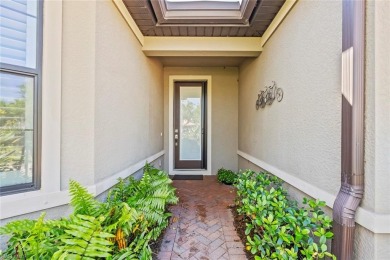 WATER and SUNRISE VIEW - Enjoy serene views of the lake from the on Panther Run Golf Club in Florida - for sale on GolfHomes.com, golf home, golf lot