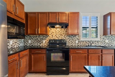 WATER and SUNRISE VIEW - Enjoy serene views of the lake from the on Panther Run Golf Club in Florida - for sale on GolfHomes.com, golf home, golf lot