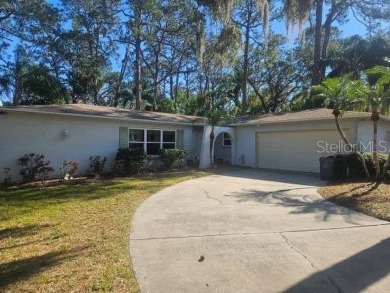 Assumable VA Loan below 3.5%.  Just 5 minutes to beach and yet on Largo Golf Course in Florida - for sale on GolfHomes.com, golf home, golf lot