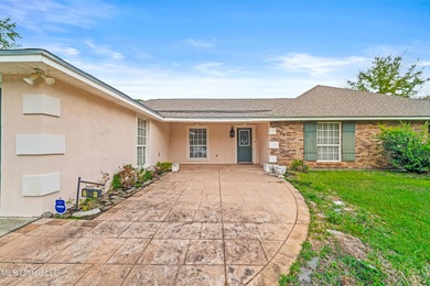 Experience the best of coastal and golf course living in this on Pass Christian Isles Golf Club in Mississippi - for sale on GolfHomes.com, golf home, golf lot