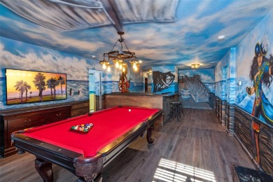 Step into the magical realm of this beautifully themed on The Oasis Club at Champions Gate in Florida - for sale on GolfHomes.com, golf home, golf lot