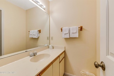 An exceptional opportunity to own a Club Villa in Sea Trail on Sea Trail Golf Resort in North Carolina - for sale on GolfHomes.com, golf home, golf lot