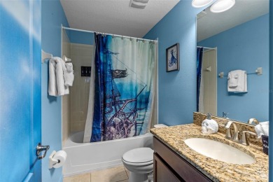 Step into the magical realm of this beautifully themed on The Oasis Club at Champions Gate in Florida - for sale on GolfHomes.com, golf home, golf lot