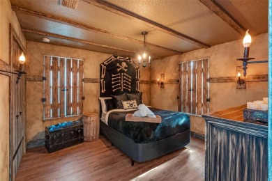 Step into the magical realm of this beautifully themed on The Oasis Club at Champions Gate in Florida - for sale on GolfHomes.com, golf home, golf lot