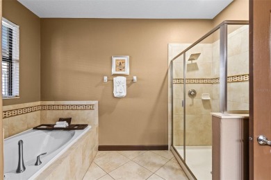Step into the magical realm of this beautifully themed on The Oasis Club at Champions Gate in Florida - for sale on GolfHomes.com, golf home, golf lot