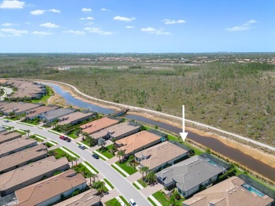 This highly upgraded Pallazio model overlooks a peaceful on Esplanade Golf and  Country Club in Florida - for sale on GolfHomes.com, golf home, golf lot