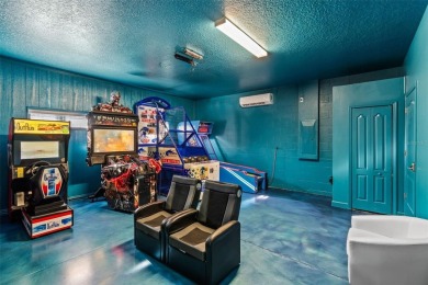 Step into the magical realm of this beautifully themed on The Oasis Club at Champions Gate in Florida - for sale on GolfHomes.com, golf home, golf lot