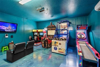 Step into the magical realm of this beautifully themed on The Oasis Club at Champions Gate in Florida - for sale on GolfHomes.com, golf home, golf lot