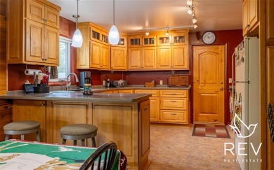 Beautiful five bedroom (could be seven), three bath home on a 15 on Olive Glenn Golf and Country Club in Wyoming - for sale on GolfHomes.com, golf home, golf lot