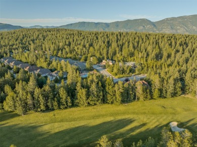 Nestled amongst tall pines overlooking the 6th green of the Golf on Meadow Lake Golf Resort in Montana - for sale on GolfHomes.com, golf home, golf lot