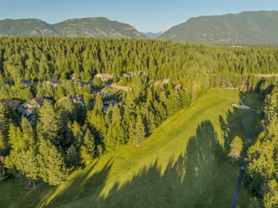 Nestled amongst tall pines overlooking the 6th green of the Golf on Meadow Lake Golf Resort in Montana - for sale on GolfHomes.com, golf home, golf lot