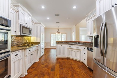 Welcome to relaxed and refined living in Stone Creek! This home on Stone Creek Golf Club in Georgia - for sale on GolfHomes.com, golf home, golf lot