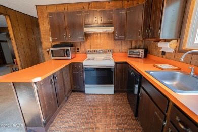 Welcome to this charming ranch-style home located in the on The Hideout Golf in Pennsylvania - for sale on GolfHomes.com, golf home, golf lot