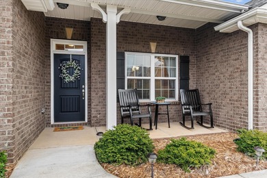 Welcome home to this beautifully maintained partial brick ranch on Fox Den Country Club in North Carolina - for sale on GolfHomes.com, golf home, golf lot