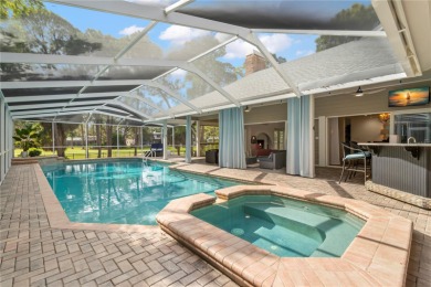 Under contract-accepting backup offers. Modern architectural on Feather Sound Country Club in Florida - for sale on GolfHomes.com, golf home, golf lot