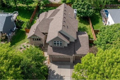 Nestled in the heart of Woodbury's serene Eagle Valley Golf on Eagle Valley Golf Course in Minnesota - for sale on GolfHomes.com, golf home, golf lot