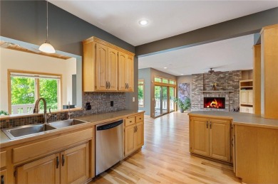 Nestled in the heart of Woodbury's serene Eagle Valley Golf on Eagle Valley Golf Course in Minnesota - for sale on GolfHomes.com, golf home, golf lot