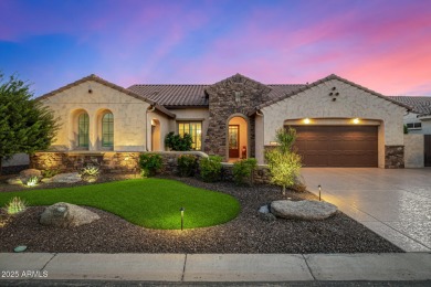 Classy Treviso home presenting curb appeal that makes you want on Tuscany Falls At Pebble Creek in Arizona - for sale on GolfHomes.com, golf home, golf lot