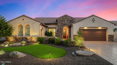 Classy Treviso home presenting curb appeal that makes you want on Tuscany Falls At Pebble Creek in Arizona - for sale on GolfHomes.com, golf home, golf lot