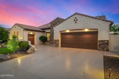 Classy Treviso home presenting curb appeal that makes you want on Tuscany Falls At Pebble Creek in Arizona - for sale on GolfHomes.com, golf home, golf lot