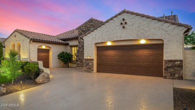 Classy Treviso home presenting curb appeal that makes you want on Tuscany Falls At Pebble Creek in Arizona - for sale on GolfHomes.com, golf home, golf lot