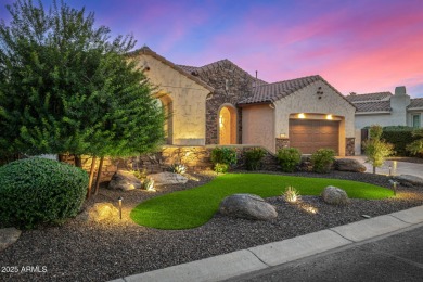Classy Treviso home presenting curb appeal that makes you want on Tuscany Falls At Pebble Creek in Arizona - for sale on GolfHomes.com, golf home, golf lot