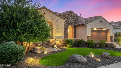 Classy Treviso home presenting curb appeal that makes you want on Tuscany Falls At Pebble Creek in Arizona - for sale on GolfHomes.com, golf home, golf lot