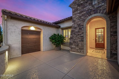 Classy Treviso home presenting curb appeal that makes you want on Tuscany Falls At Pebble Creek in Arizona - for sale on GolfHomes.com, golf home, golf lot